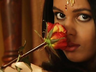 Erotic Indian chick is playing with flowers