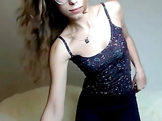 Hot and nerdy looking teen rubbing her wet pussy live on camera for us